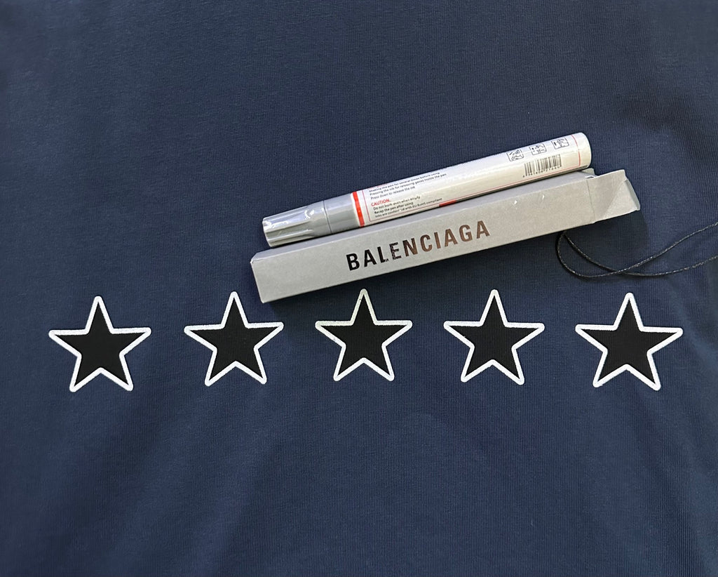 Balenciaga dark blue T-shirt with five outlined star graphics and hang tags