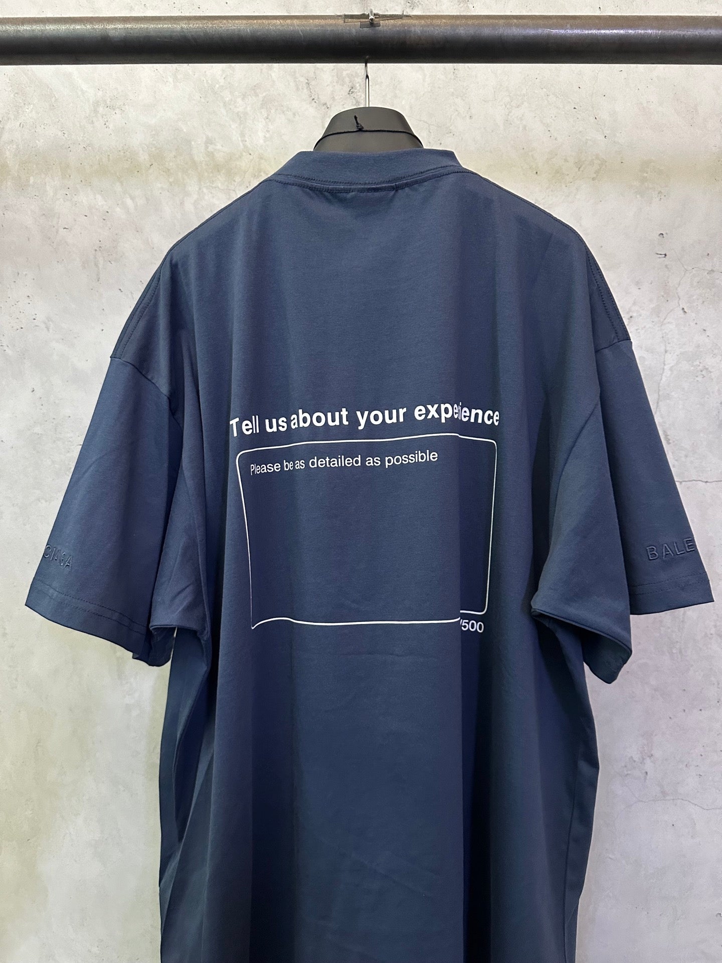 Balenciaga dark blue back-print T-shirt with slogan panel and '500' mark
