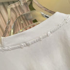 White T-shirt crewneck seam with ribbed collar and double-stitched trim
