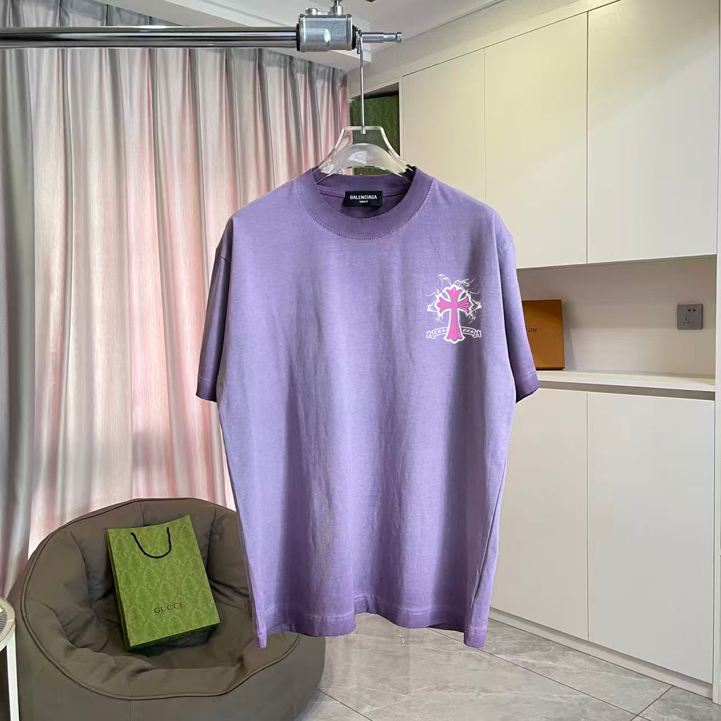 Lavender short-sleeve T-shirt with small pink cross graphic on the chest