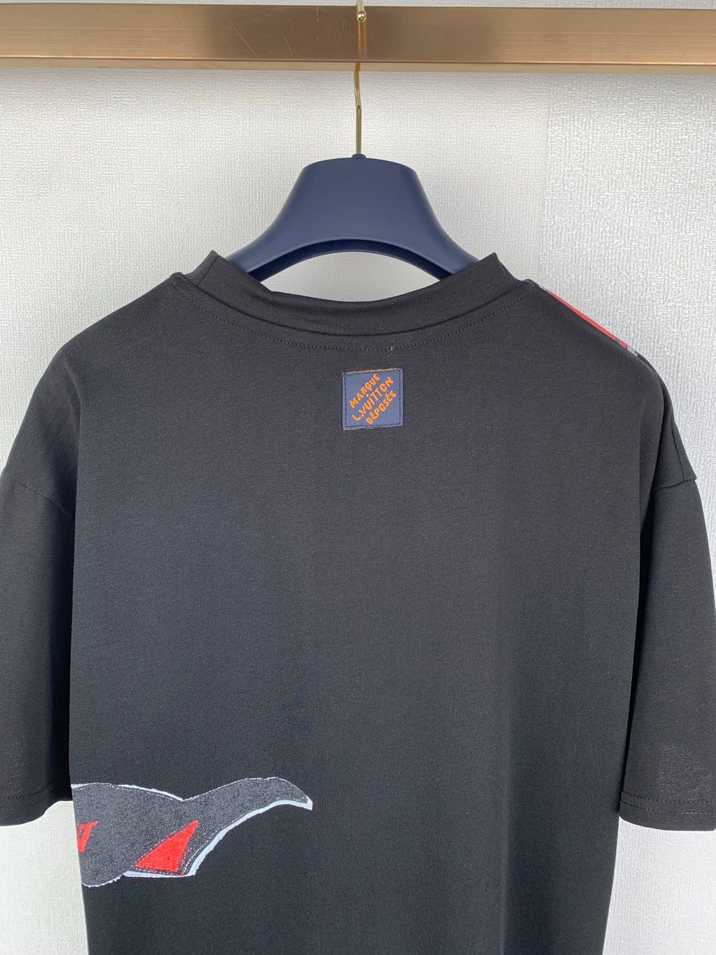 Louis Vuitton black T-shirt with small rectangular back neck logo patch