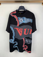 Louis Vuitton graphic T-shirt in black with red, blue, and white logo print