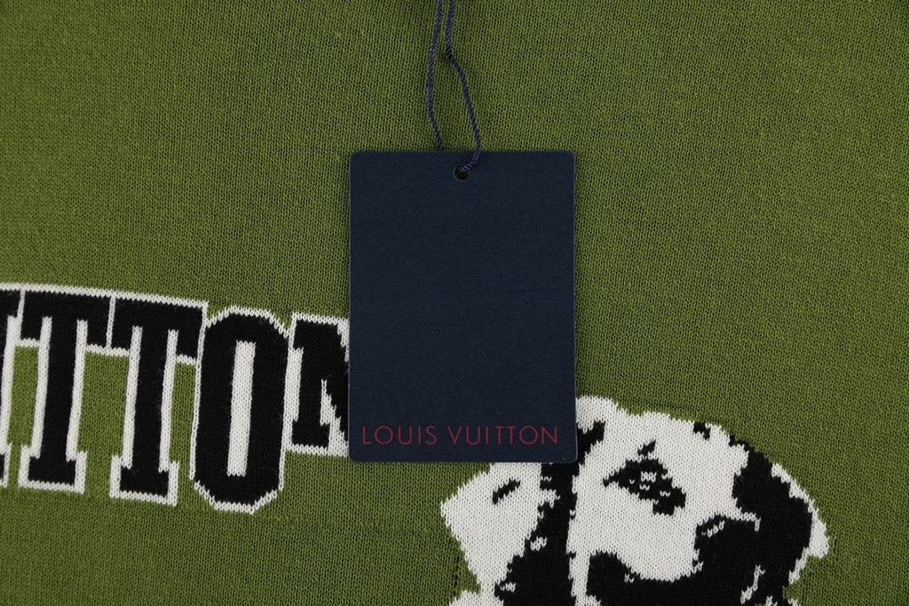 Green T-shirt with dog graphic, VUITTON lettering, and a navy hang tag