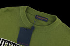 Green crewneck T-shirt with ribbed collar and inner neck brand label