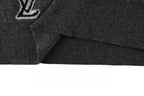 Louis Vuitton short-sleeve polo shirt ribbed hem detail on black knit fabric