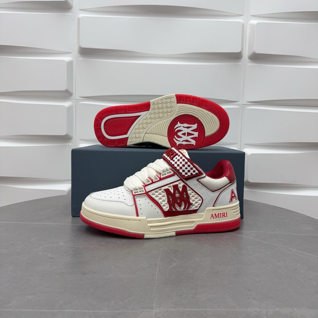 Amiri low-top sneakers with white uppers, red outsole, and check strap
