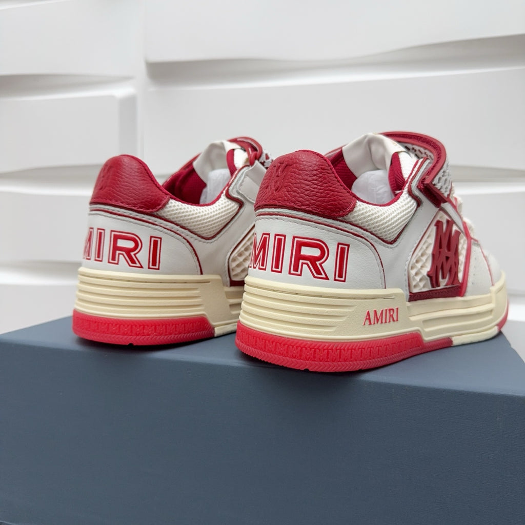 Amiri low-top sneakers heel and side view, white leather with red and “AMIRI”