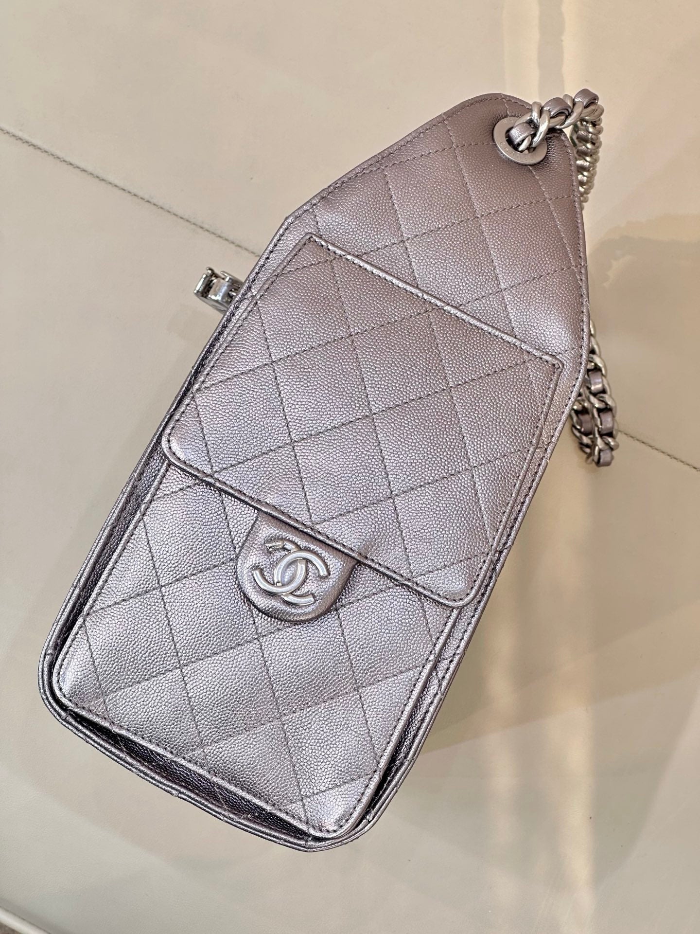 Quilted leather crossbody bag with flap and chain strap, Chanel CC logo, silver tone