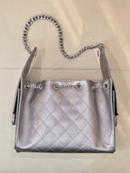 Quilted leather top-handle shoulder bag with chain handles, Chanel CC charm, silver tone