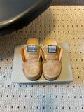 Tan suede Balenciaga slip-on sandals, padded strap, black logo label