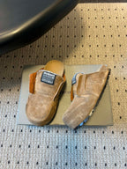 Tan suede Balenciaga slip-on sandals, open side view, strap detail
