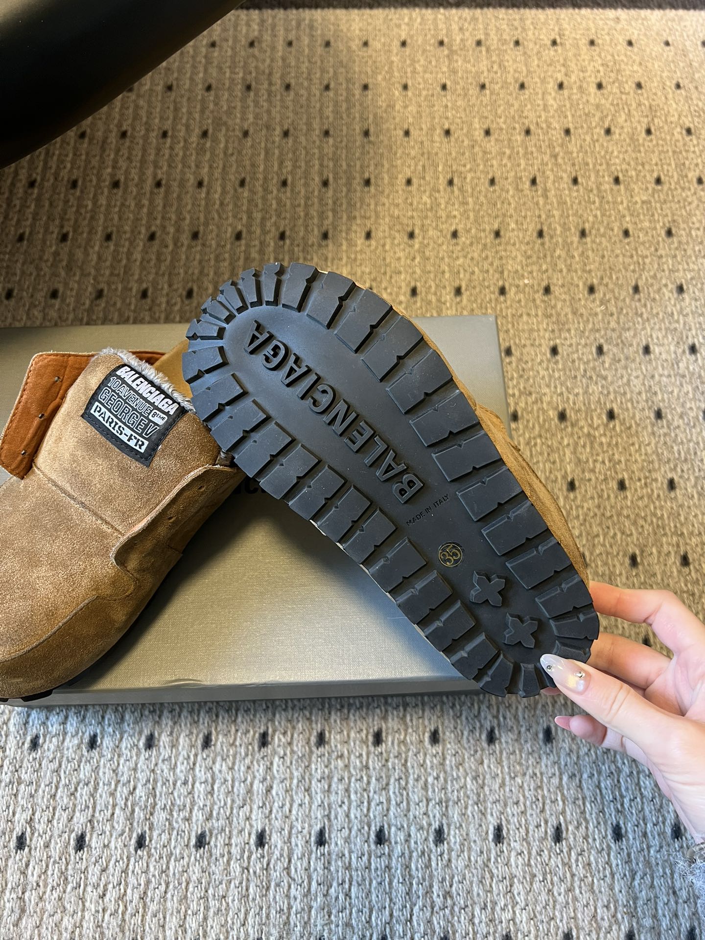 Tan suede Balenciaga sandals with black rubber outsole and deep tread