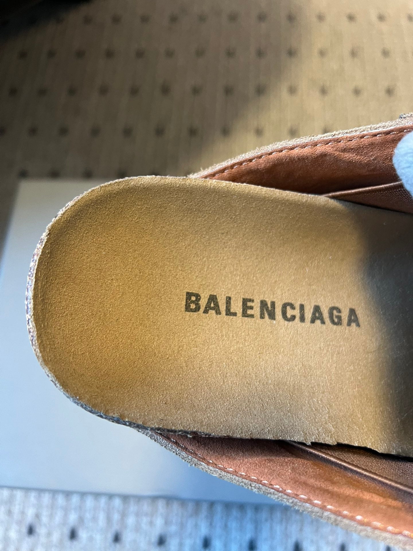 Tan suede Balenciaga footbed with BALENCIAGA text