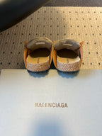 Tan suede Balenciaga sandals, back view, textured heel and logo insole