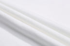 Off-white fabric cloth with smooth draped texture