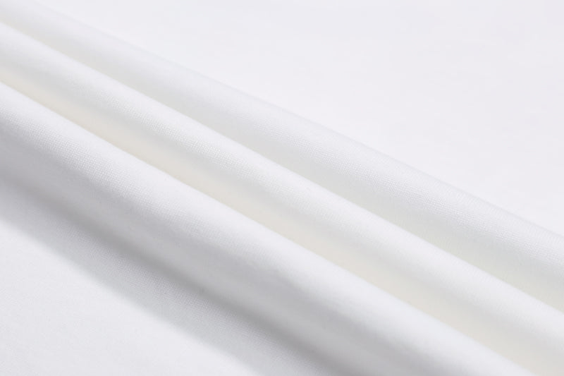 Off-white fabric close-up with smooth texture