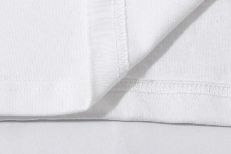 Off-white T-shirt fabric closeup with stitched collar detail