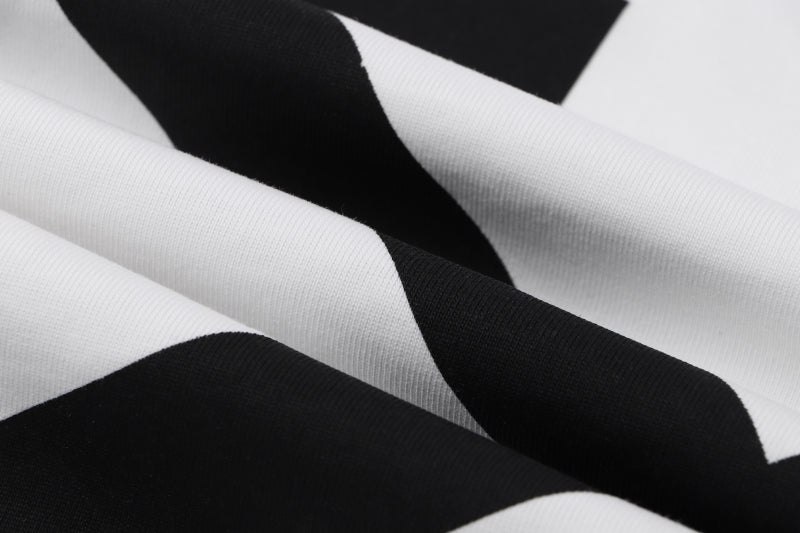 Off-white T-shirt with black graphic lines on white fabric