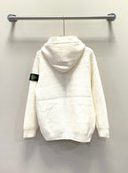 White zip-up hoodie with hood, front kangaroo pocket, sleeve Stone Island badge