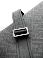 Fendi strap detail with FENDI lettering on dark gray fabric
