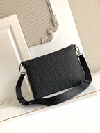 Fendi baguette-style bag in dark logo canvas with crossbody strap and zip top