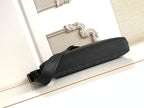 Fendi bag with textured dark logo exterior and long shoulder strap