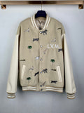 Beige Louis Vuitton long-sleeve jacket with animal and palm embroidery, button front