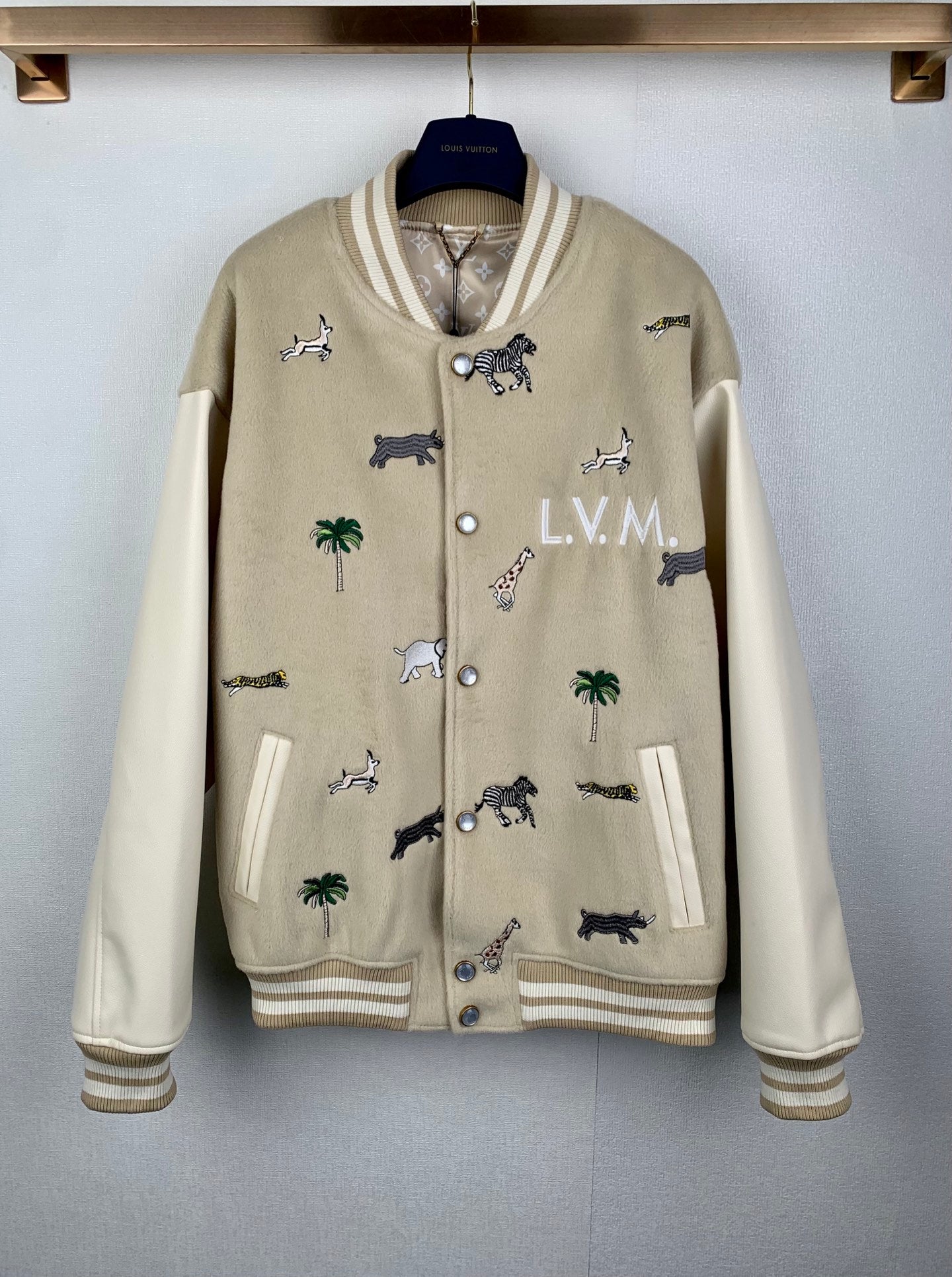 Beige Louis Vuitton long-sleeve jacket with animal and palm embroidery, button front