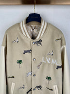Beige Louis Vuitton jacket with striped collar, button placket, animal and L.V.M. motifs
