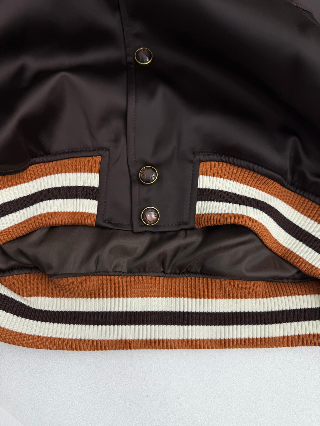 Louis Vuitton bomber jacket, dark satin with snap buttons and striped ribbed hem