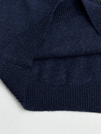 Navy knit sweater knit texture with ribbed trim detail