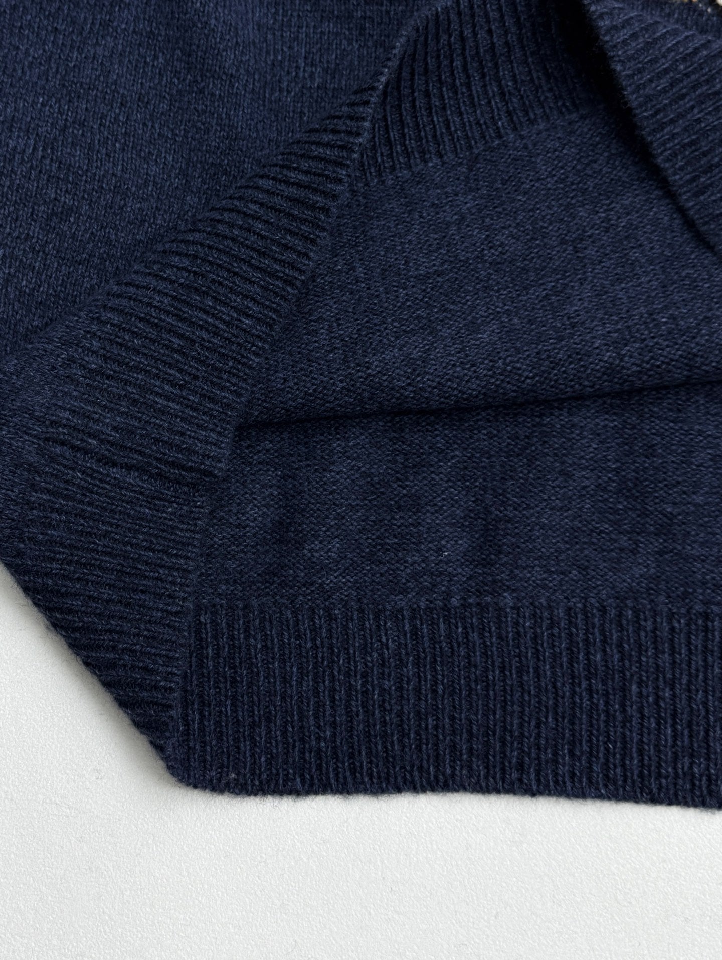 Navy knit sweater knit texture with ribbed trim detail