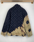 Louis Vuitton long jacket back view, dark navy monogram with gold patch overlay