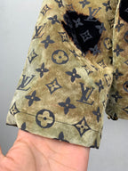 Louis Vuitton long jacket pocket area, tan-gold fabric with navy monogram print