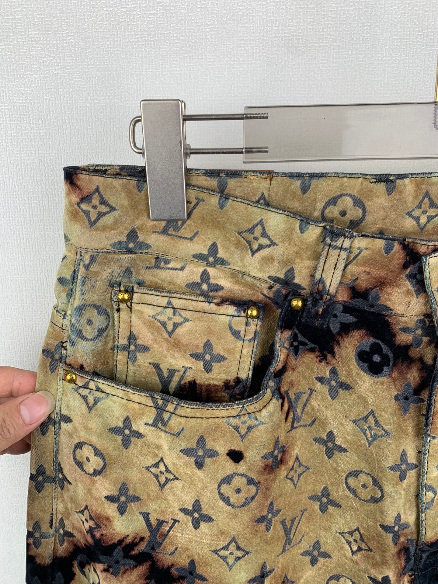 Louis Vuitton monogram long pants detail: tan waistband with front patch pockets