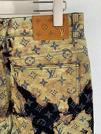 Louis Vuitton monogram jeans with front patch pocket and leather trim