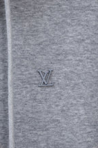 Light gray hoodie with small Louis Vuitton LV logo on the chest.