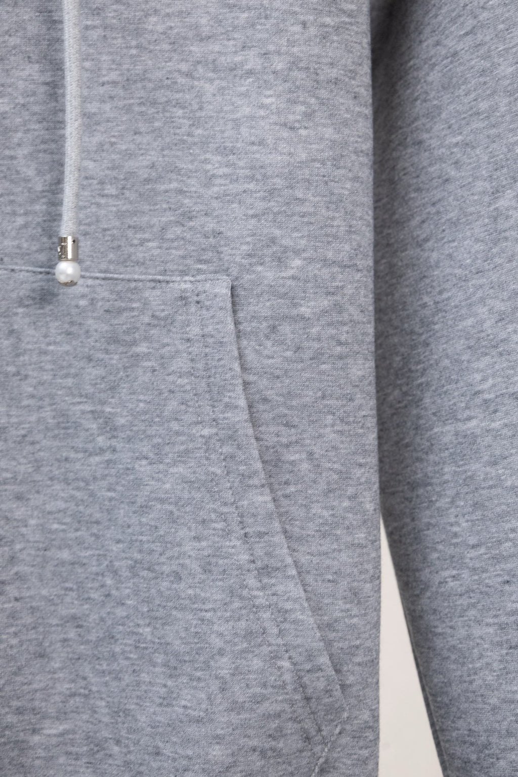 Gray zip-up sweatshirt with drawstring toggle detail