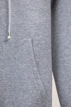 Gray zip-up sweatshirt with drawstring toggle detail