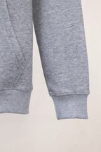 Gray sweatshirt sleeve with ribbed cuff and stitched hem