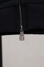 Burberry long zip jacket zipper pull and ribbed hem, dark fabric