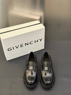 Black leather loafers with square logo buckle, metal detail on vamp