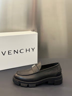 Single dark leather loafer with square logo buckle strap and chunky platform sole