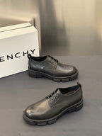 Black leather lace-up derby shoes with chunky platform sole and round toe
