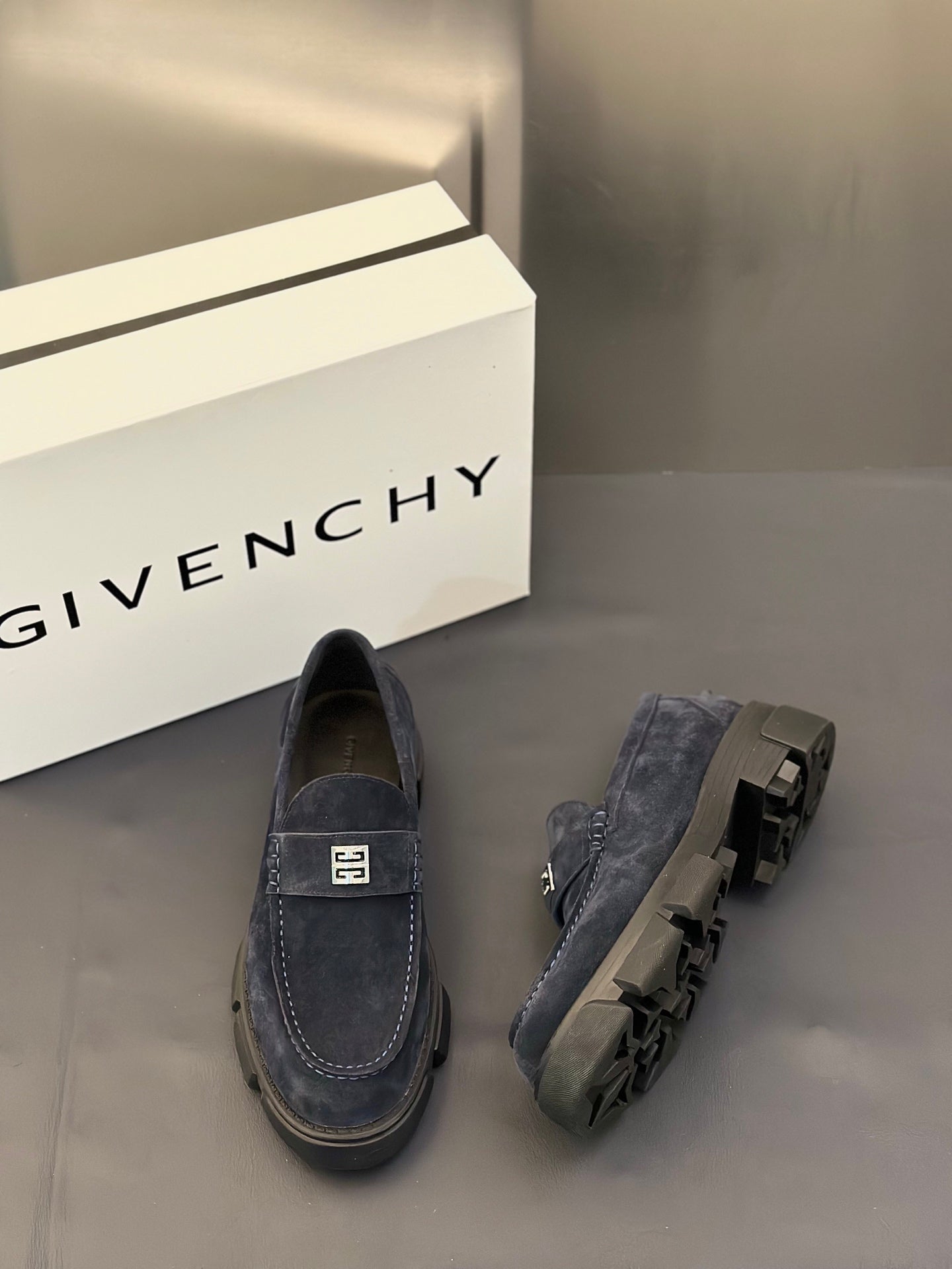 Givenchy suede loafers, dark navy, pair shown with top strap and stacked heel profile