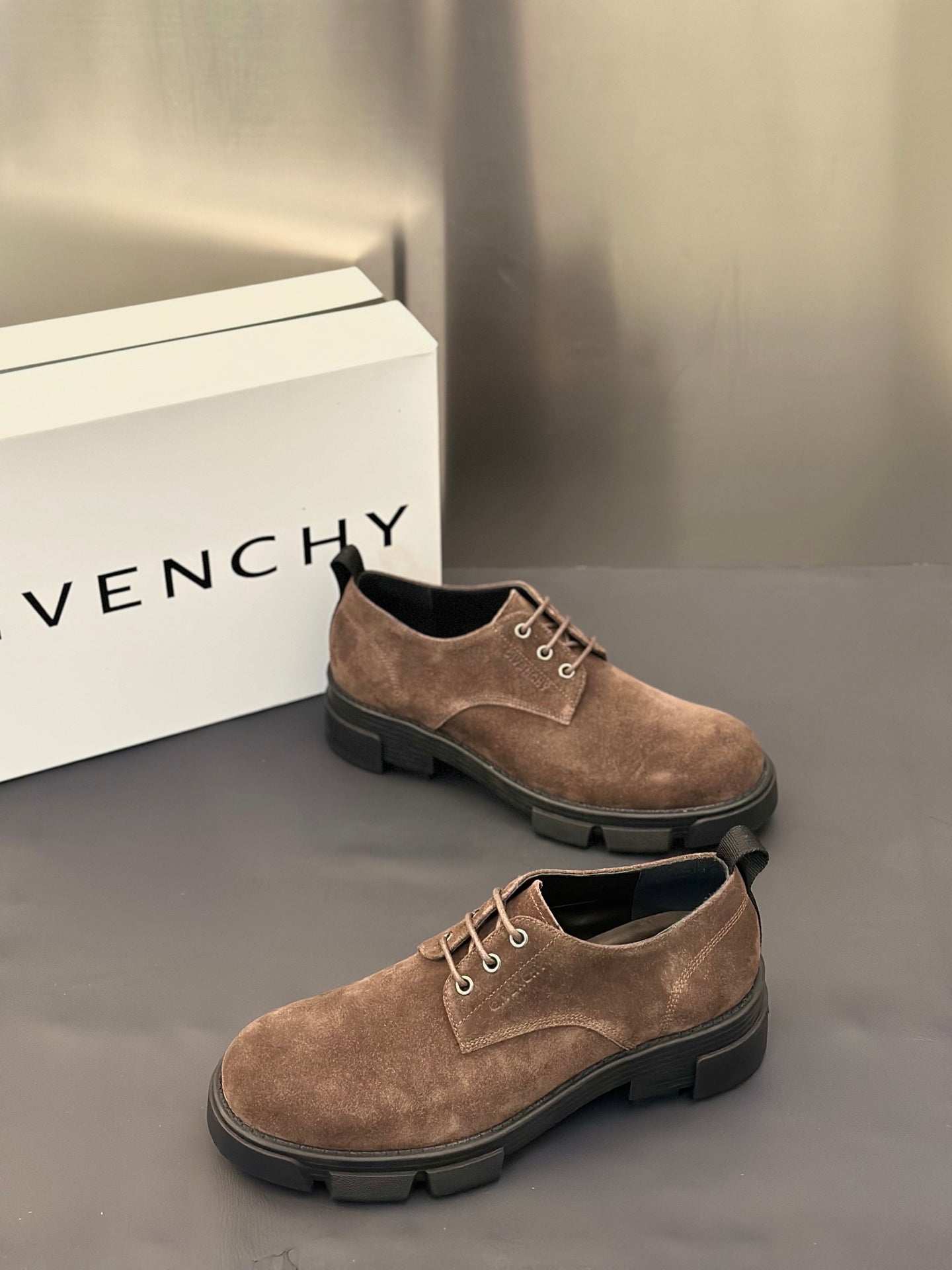 Brown suede lace-up shoes with round toe and chunky dark rubber sole