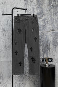 Dark gray denim pants with black cross appliques, straight leg, button and zip fly