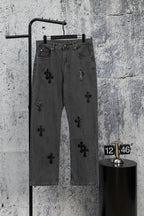 Dark gray denim pants with black cross appliques, straight leg, button and zip fly