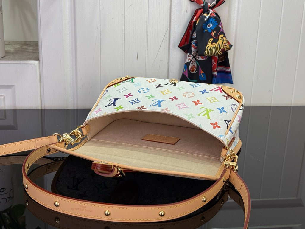 Louis Vuitton crossbody bag with flap open, multicolor monogram canvas and tan interior