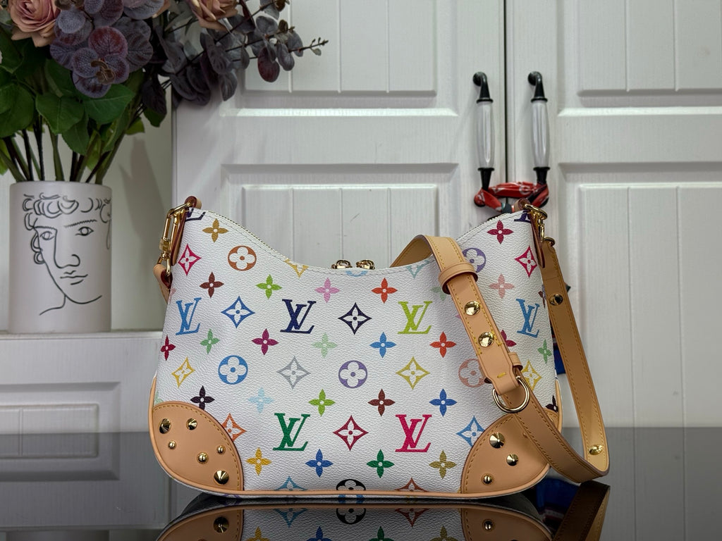 Louis Vuitton multicolor monogram handbag with tan leather handles and gold hardware